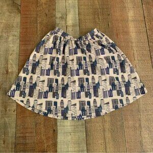 Penny candy girls skirt with city buildings in white and blue